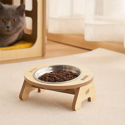 gamelle chat bol inox support bois surélevé avec bol rempli de croquettes chat gris dans une niche en bois à l'arrière