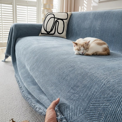 housse de canapé anti griffe de chat roux qui dort sofa chenille bleu protection anti-poils