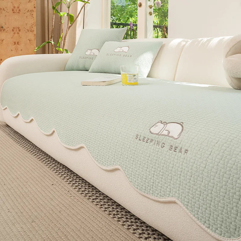 protection canapé chat housse vert rafraîchissante antidérapante sur un canapé